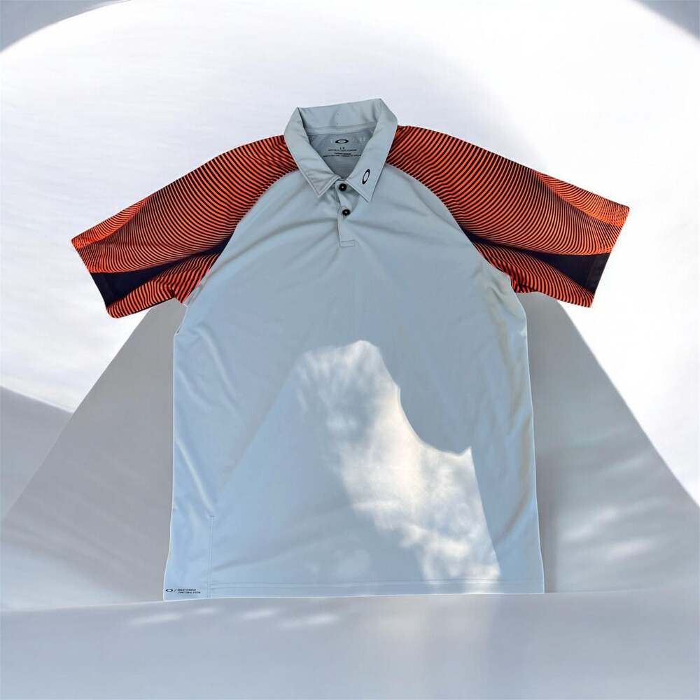 Oakley Aero Motion Golf Polo Shirt Grey with Orange Tiger Stripe Sleeves